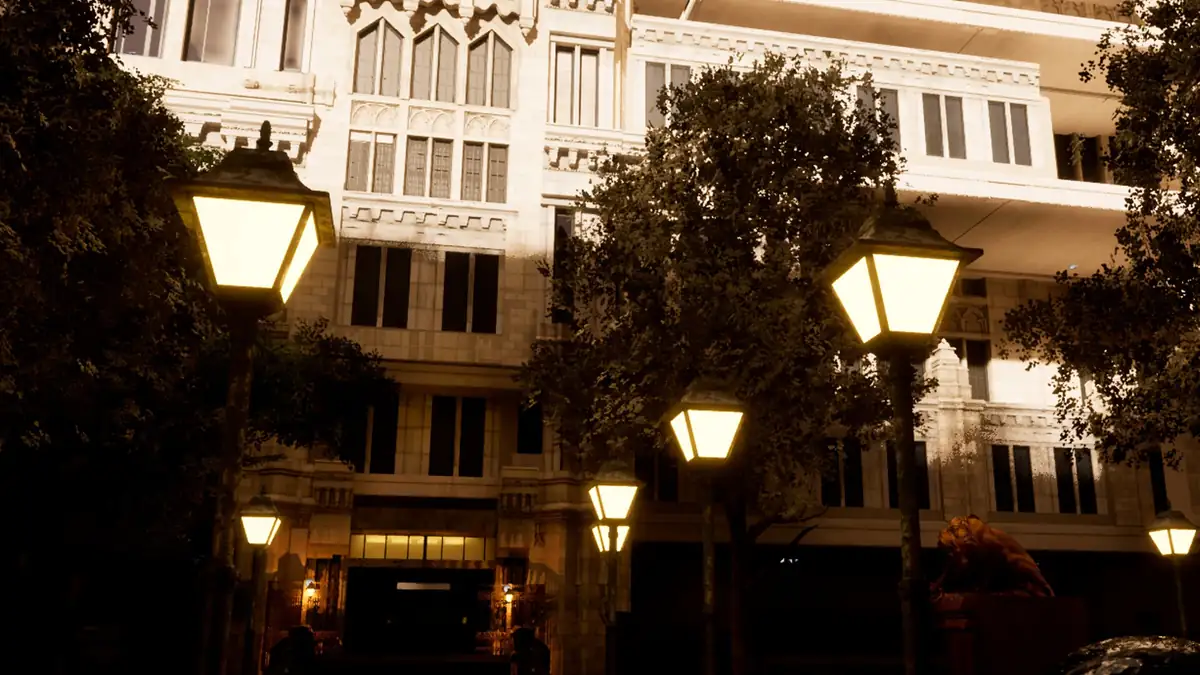 Fachada de la casa con farolas encendidas